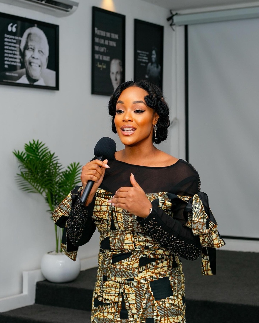Anari Sam-Jaja, founder of ASJ Consultancy, speaking with a microphone